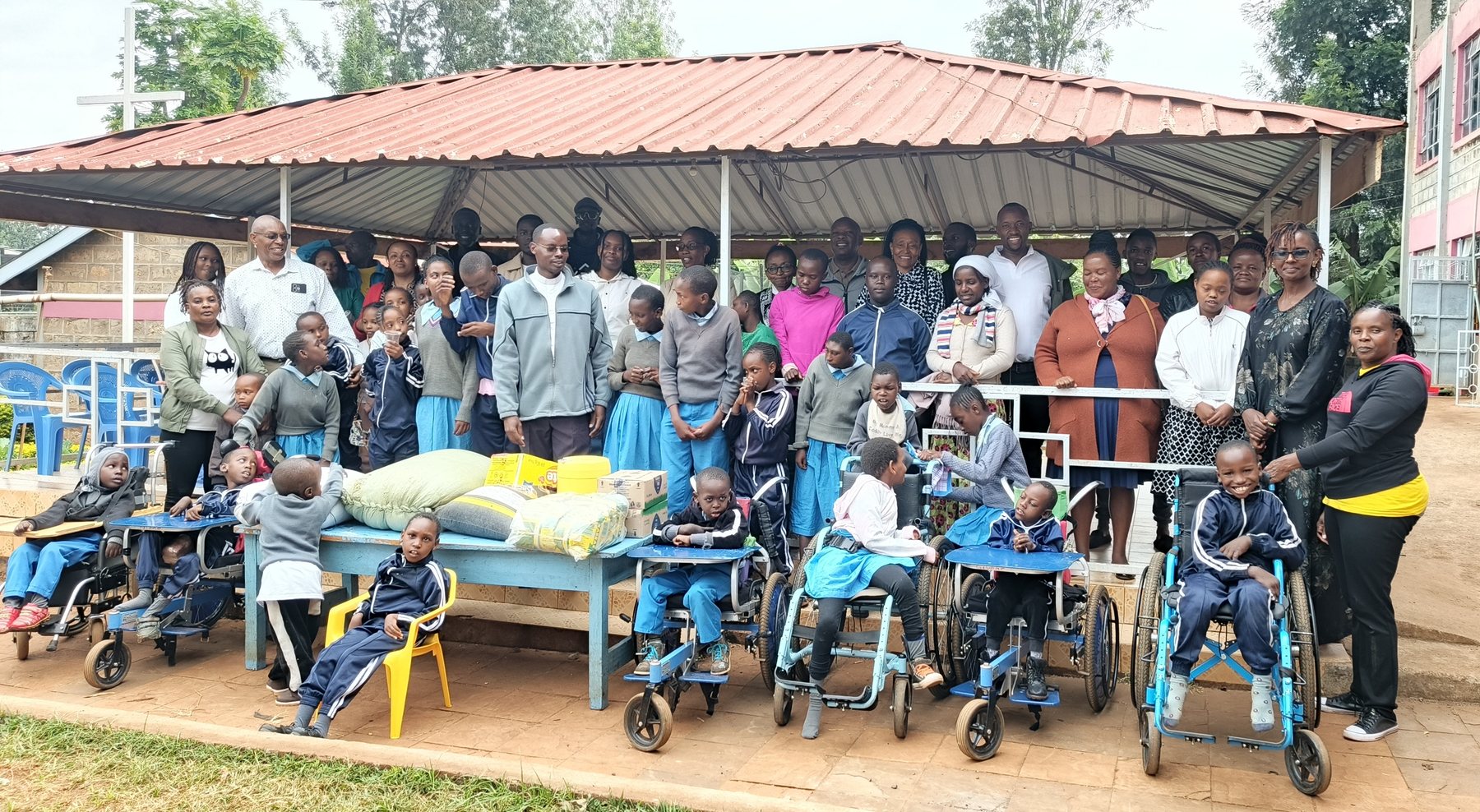 The children, families and staff of the Don Orione Centre Kaburugi gathered together
