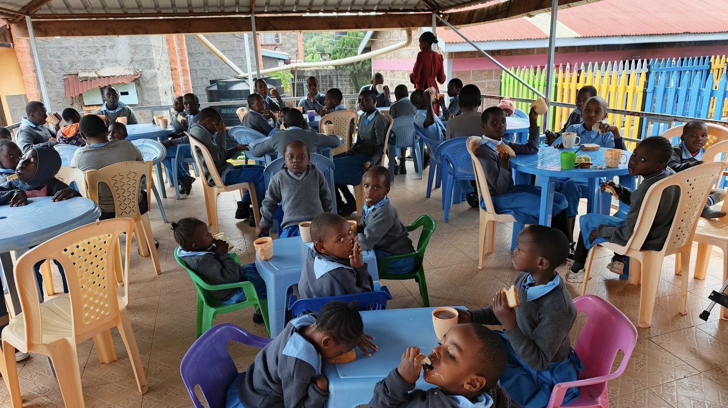 Children sharing a meal together at the centre