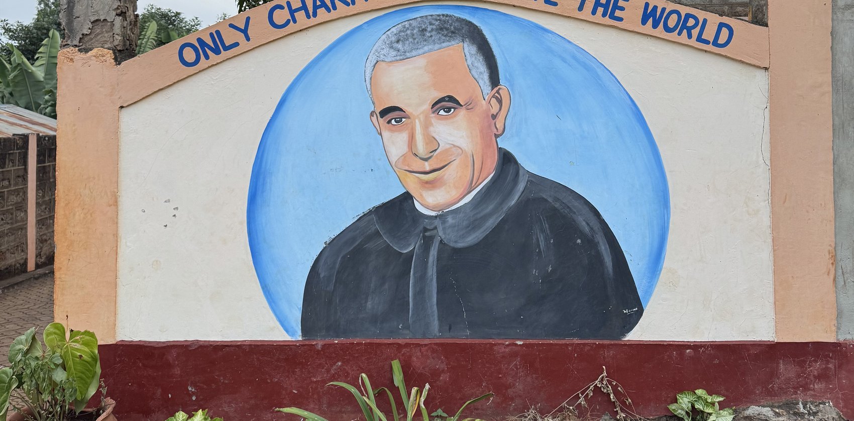 Mural of Saint Luigi Orione: Only charity will save the world